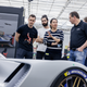 Designers gathered around an iteration of the V-Series.R.